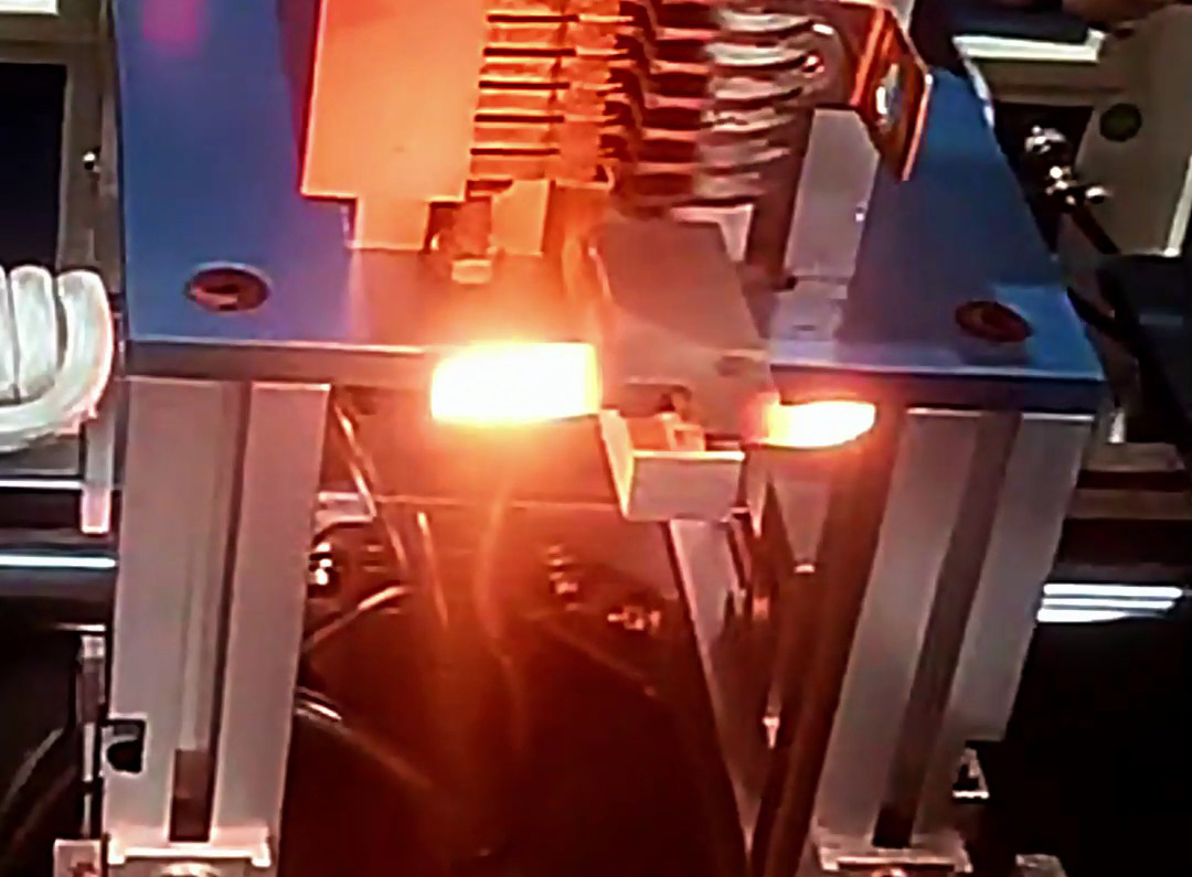 雙高頻機對游標卡尺零件進行自動化淬火熱處理